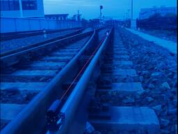 Portable rail laser alignment device for measuring railway track level